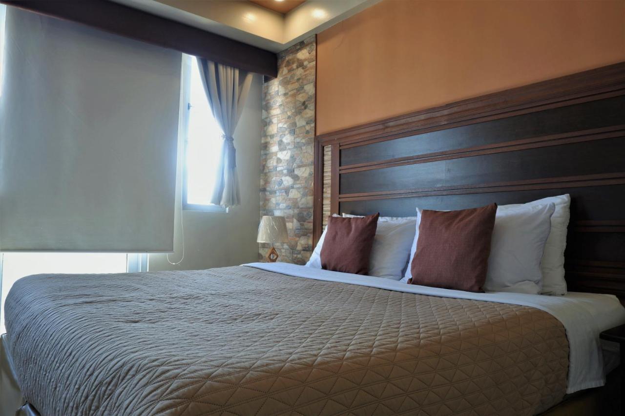 One Palm Tree Villas 马尼拉 外观 照片