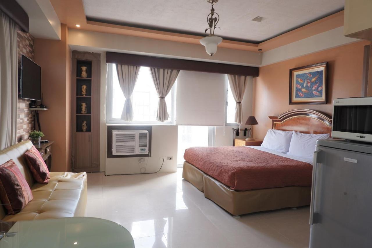One Palm Tree Villas 马尼拉 外观 照片
