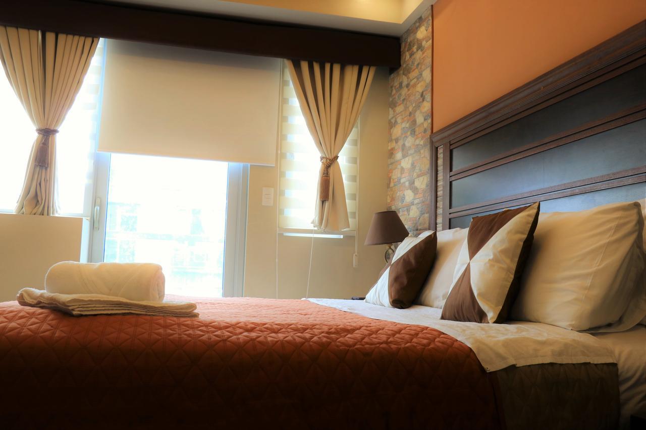 One Palm Tree Villas 马尼拉 外观 照片